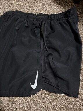 Nike dri-fit Black Athletic Shorts with White Swoosh